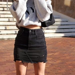 Black distressed denim skirt